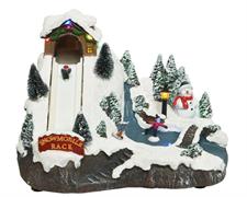 PAESAGGIO NATALIZIO PISTA SNOWBOARD CON MOVIMENTO H.16X23X17 N13